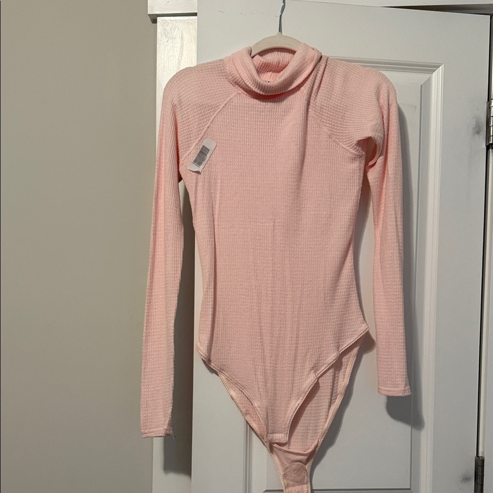 Free People Soft Pink Turtleneck Bodysuit. Intimately free people.